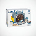 Perro con transportín y set de cuidados