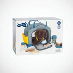Perro con transportín y set de cuidados