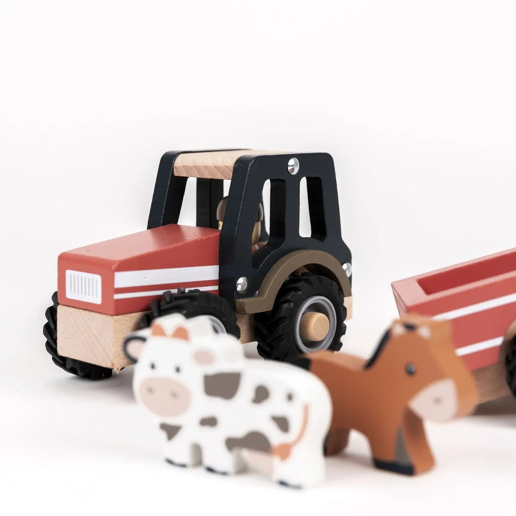 Tractor con remolque de madera